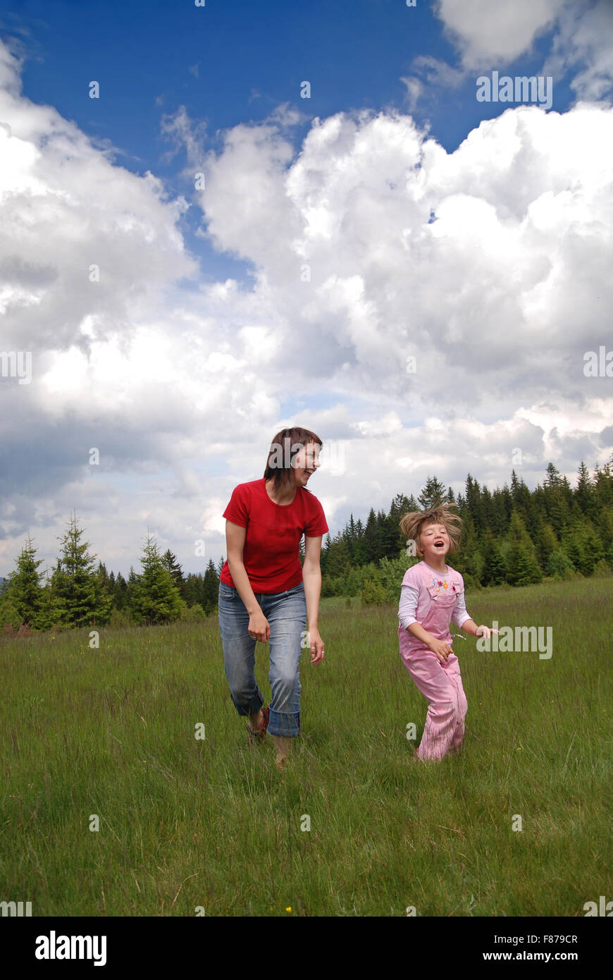 happy girls running in nature Stock Photo - Alamy