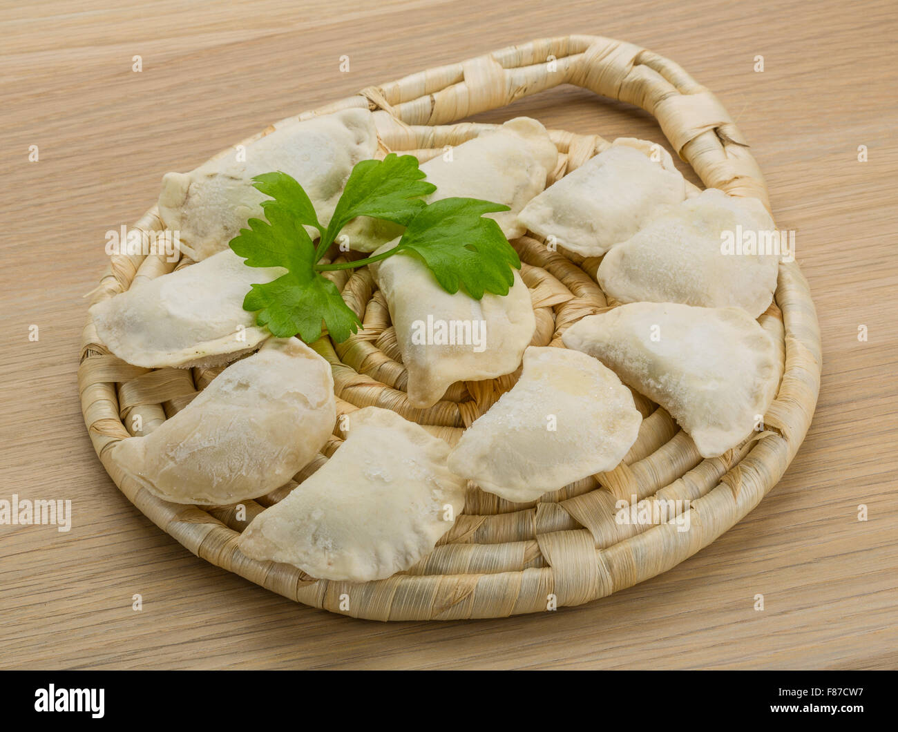 Raw Ukrainian vareniki on the board Stock Photo - Alamy