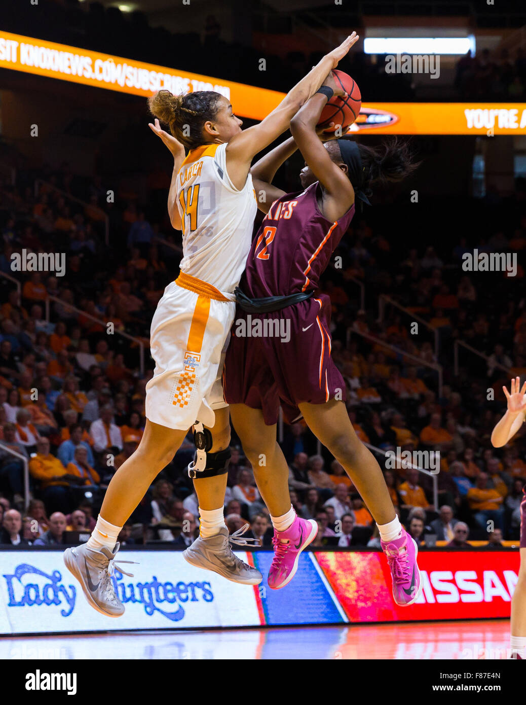 December 6, 2015: Chanette Hicks #12 of the Virginia Tech Hokies tries to shoots the ball over Andraya Carter #14 of the Tennessee Lady Volunteers during the NCAA basketball game between the University of Tennessee Lady Volunteers and the Virginia Tech Hokies at Thompson Boling Arena in Knoxville TN Tim Gangloff/CSM Stock Photo