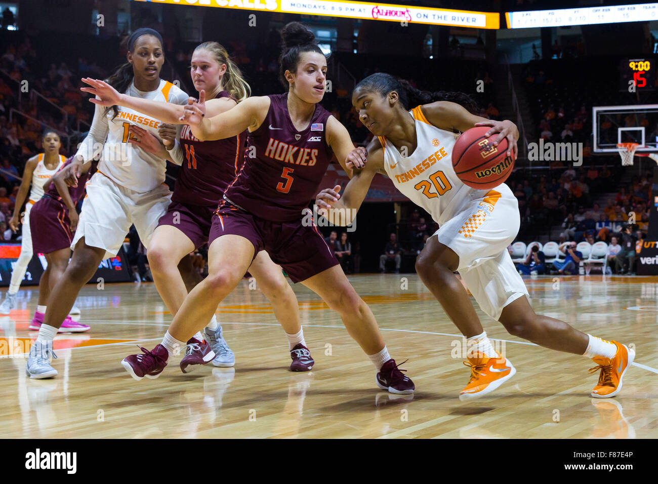 December 6, 2015: Te'a Cooper #20 of the Tennessee Lady Volunteers drives to the basket against Vanessa Panousis #5 of the Virginia Tech Hokies during the NCAA basketball game between the University of Tennessee Lady Volunteers and the Virginia Tech Hokies at Thompson Boling Arena in Knoxville TN Tim Gangloff/CSM Stock Photo