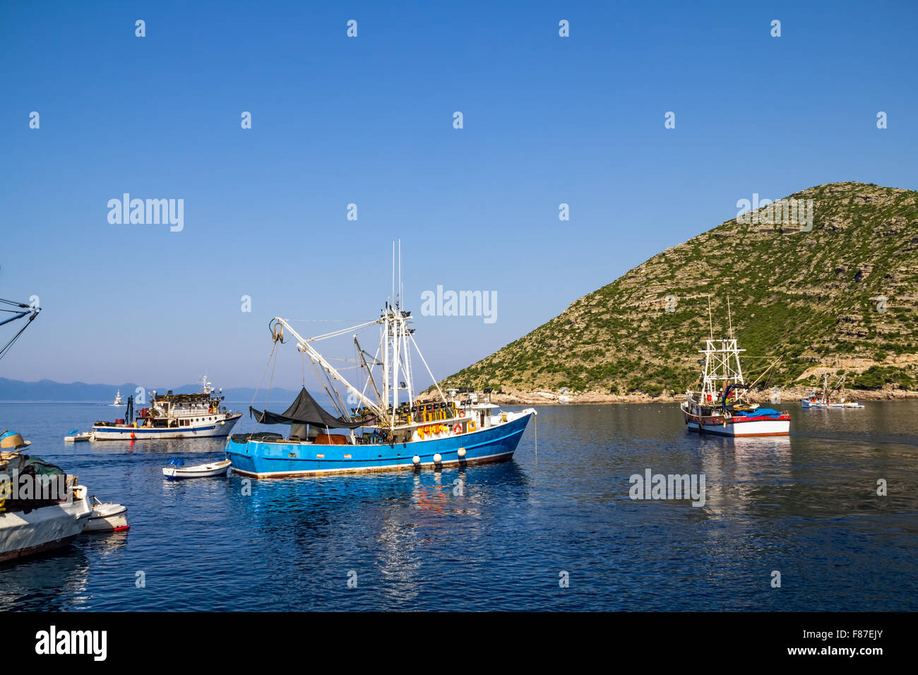 Blue fishing boat Stock Photo - Alamy