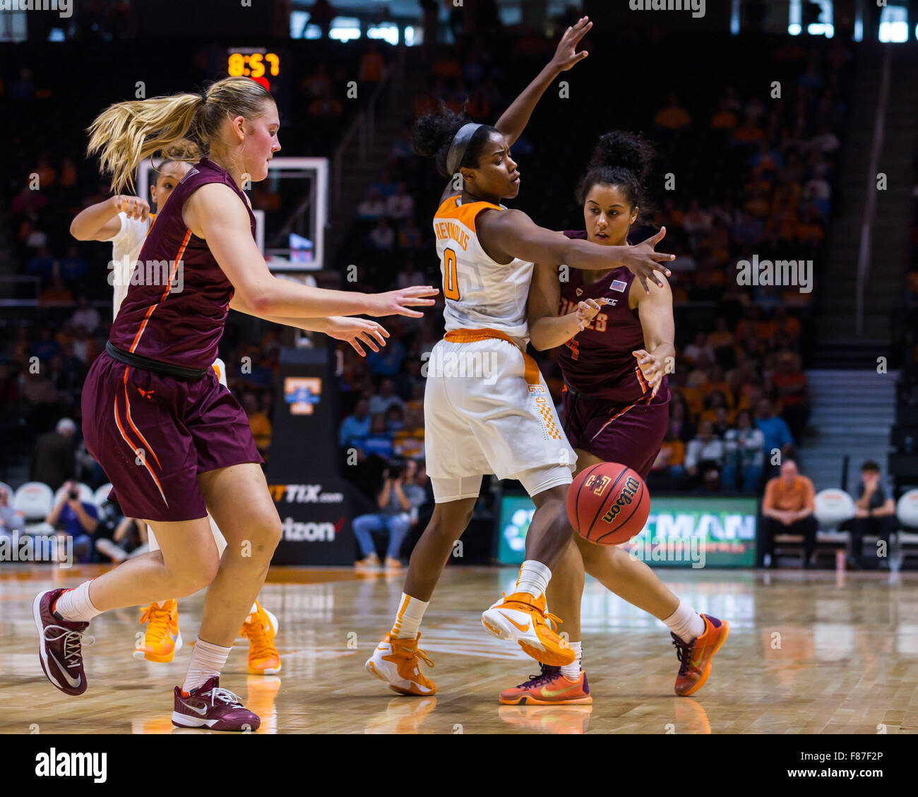 December 6, 2015: Hannah Young #4 passes the ball to Regan Magarity #11 of the Virginia Tech Hokies against the defense of Jordan Reynolds #0 of the Tennessee Lady Volunteers during the NCAA basketball game between the University of Tennessee Lady Volunteers and the Virginia Tech Hokies at Thompson Boling Arena in Knoxville TN Tim Gangloff/CSM Stock Photo