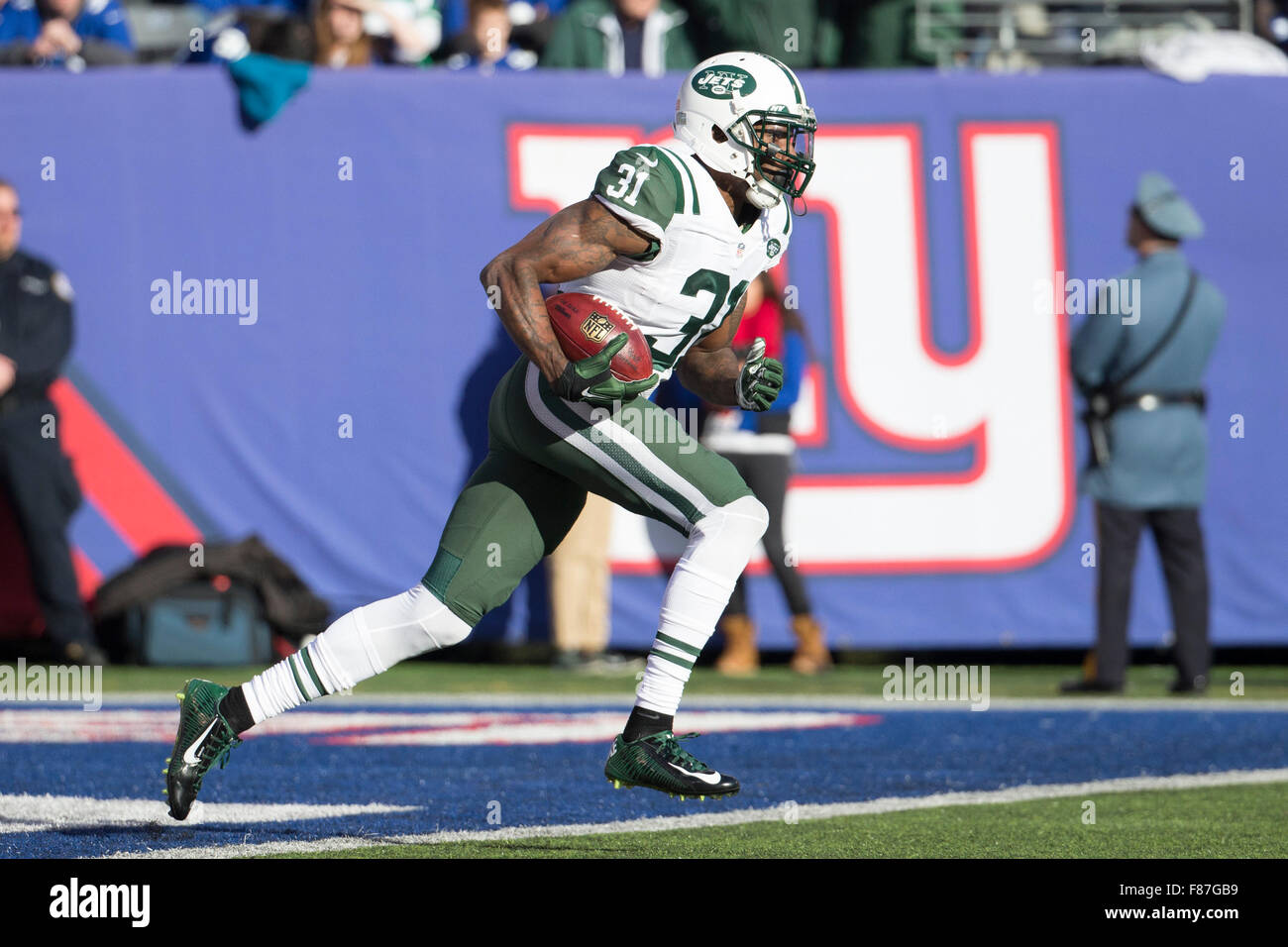 New York Jets cornerback Antonio Cromartie (31) carries the ball on a kick  in the 2nd quarter against the New York Giants at MetLife Stadium in East  Rutherford, New Jersey on December