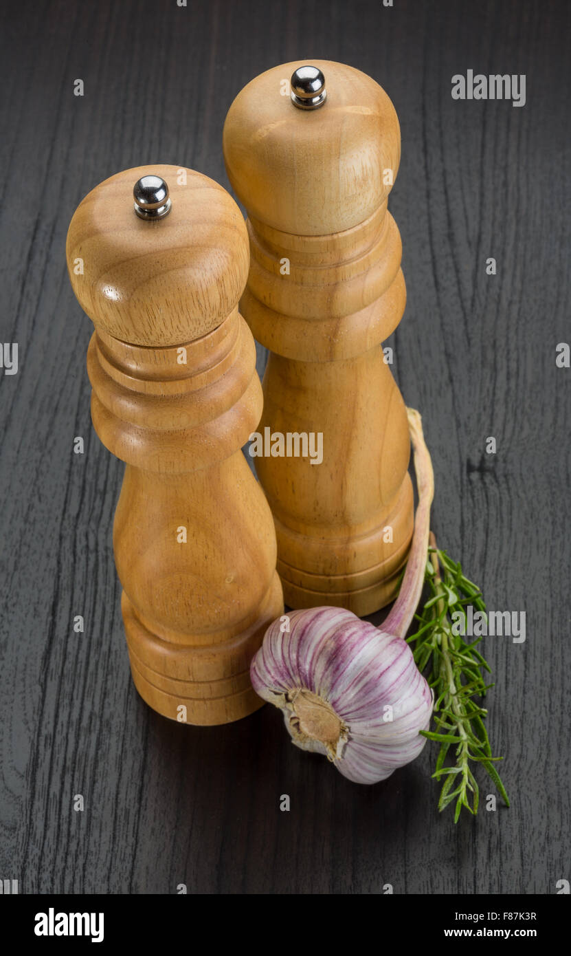 Pepper mill with garlic and rosemary Stock Photo Alamy