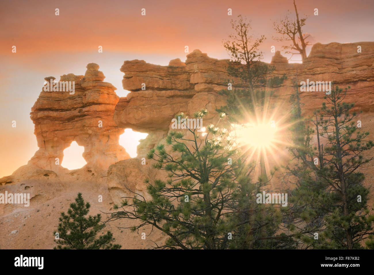 Sunburst through rock arches. Bryce National Park, Utah Stock Photo