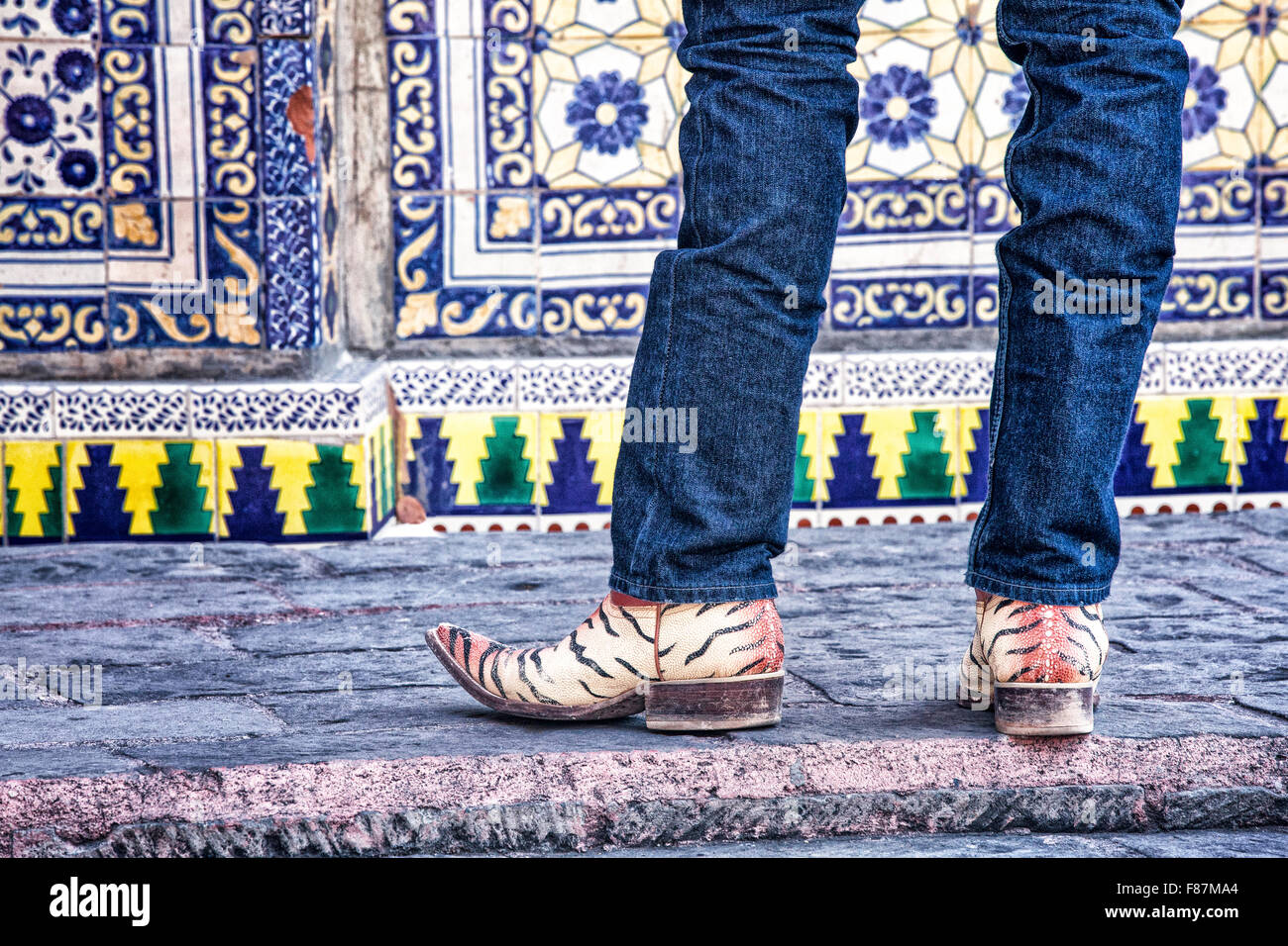 Fancy boots and tile on display in Dolores Hidalgo, Mexico. Stock Photo