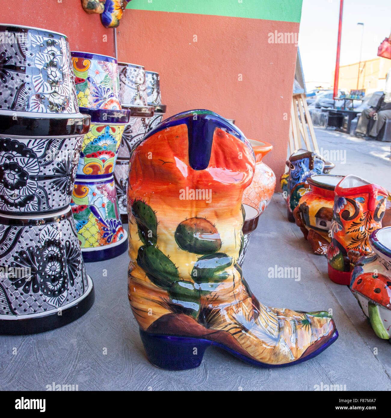 Colorful ceramic cowboy boot in a street market, Dolores Hidalgo, Guanajuato, Mexico. Stock Photo