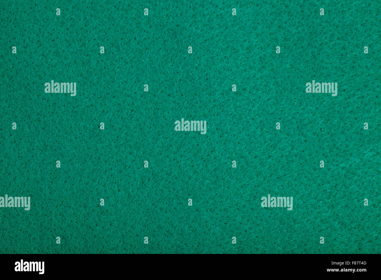 Closeup of green poker table felt background Stock Photo Alamy