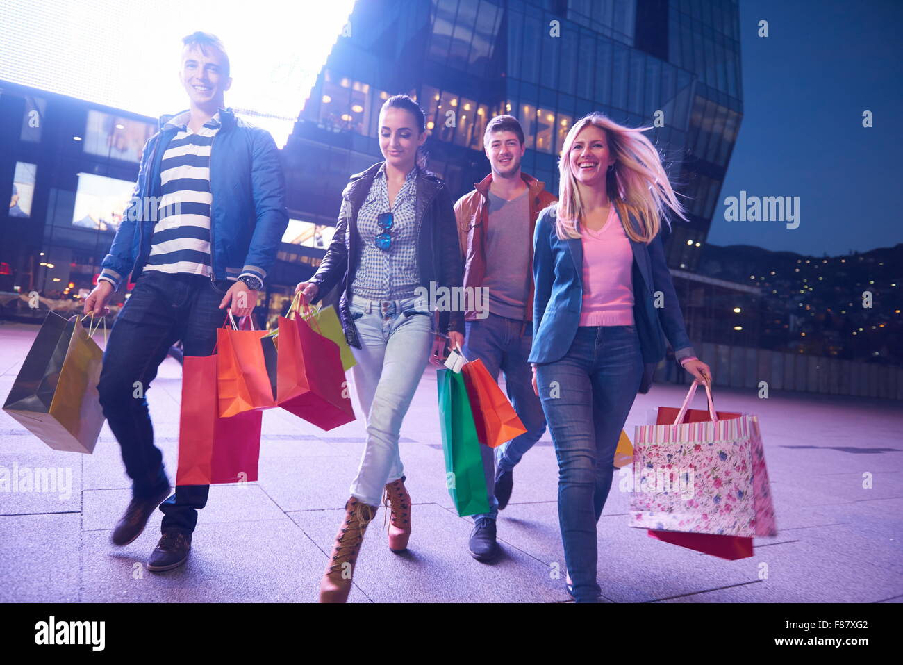 Group Of Friends Enjoying Shopping Trip Together group of happy young ...