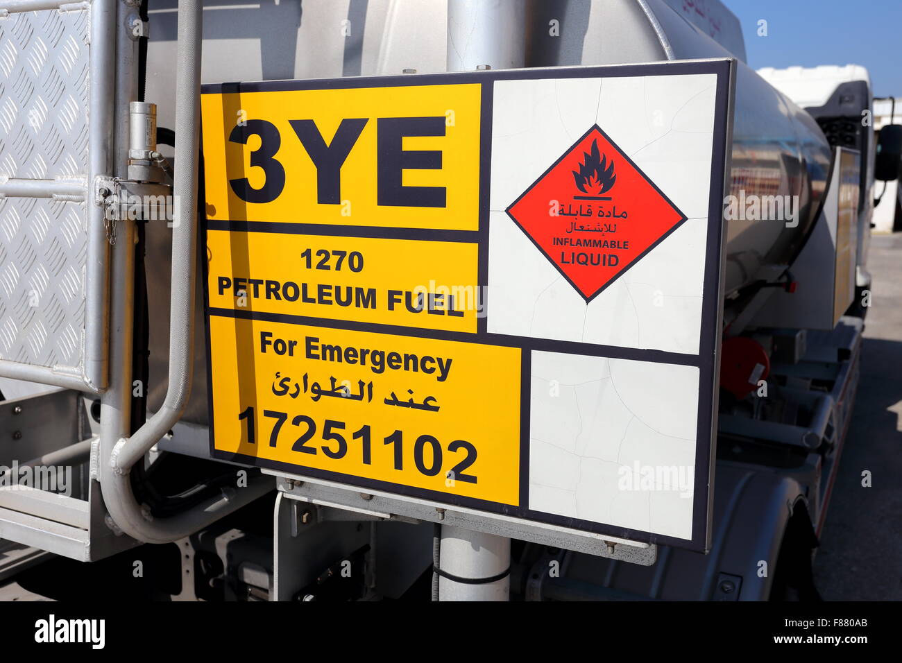 Sign in English and Arabic on the back of a tanker warning of a dangerous cargo (petroleum), Kingdom of Bahrain Stock Photo