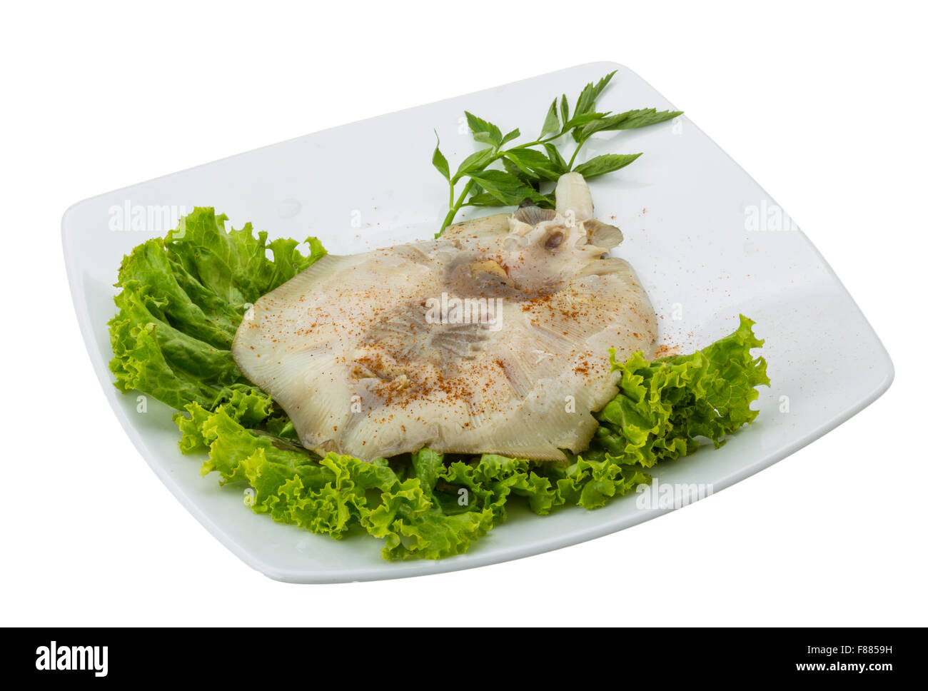 Grilled ray fish - Batoidea with salad Stock Photo - Alamy