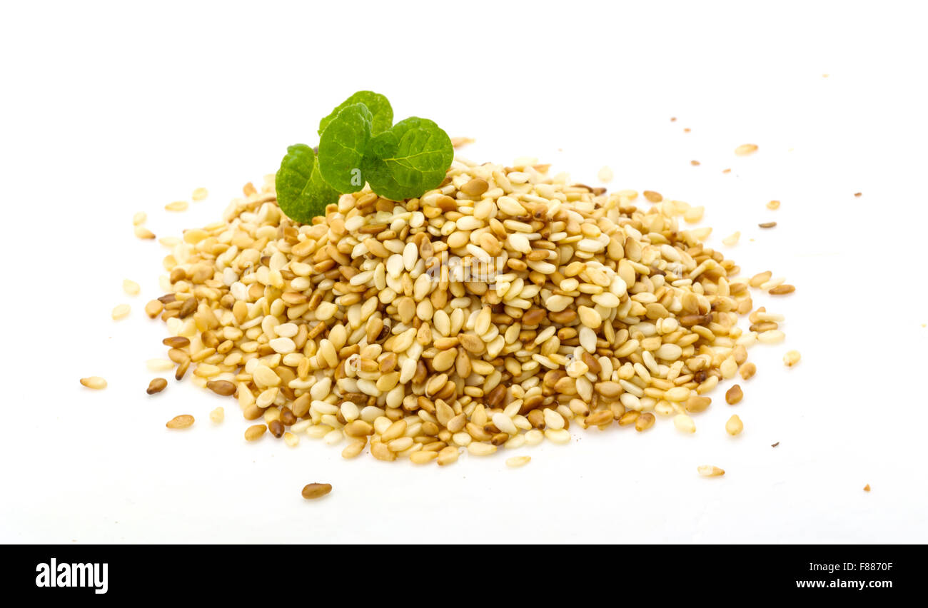 Roasted sesame seeds heap isolated Stock Photo Alamy
