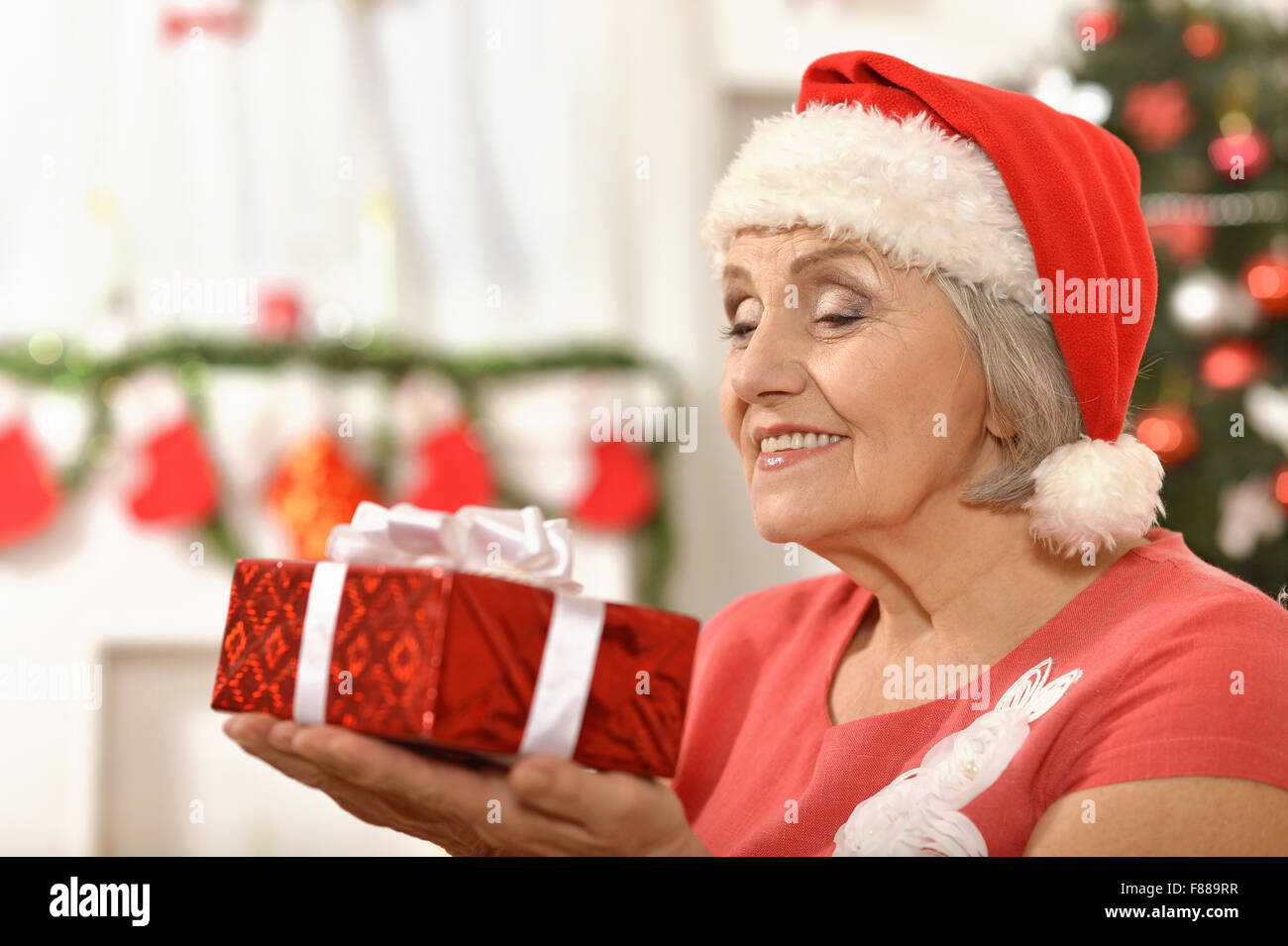 Senior woman with   gifts Stock Photo