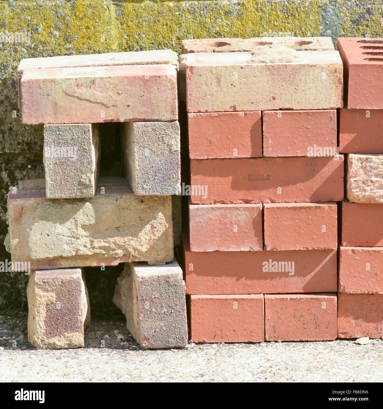 Stack of new and old red house bricks Stock Photo Alamy