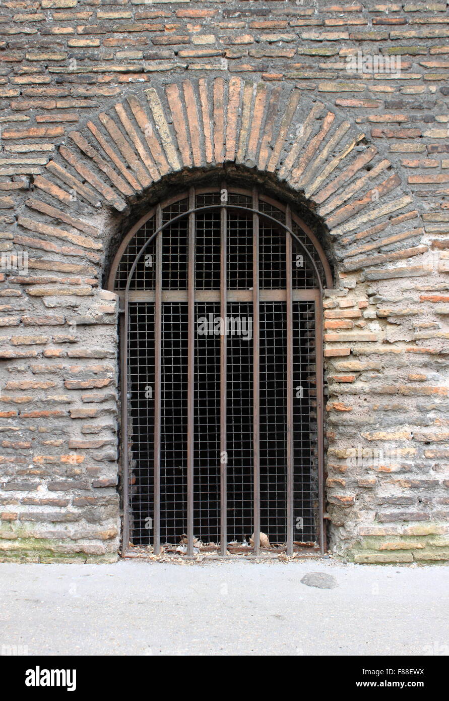 Closed door a prison with bars Stock Photo