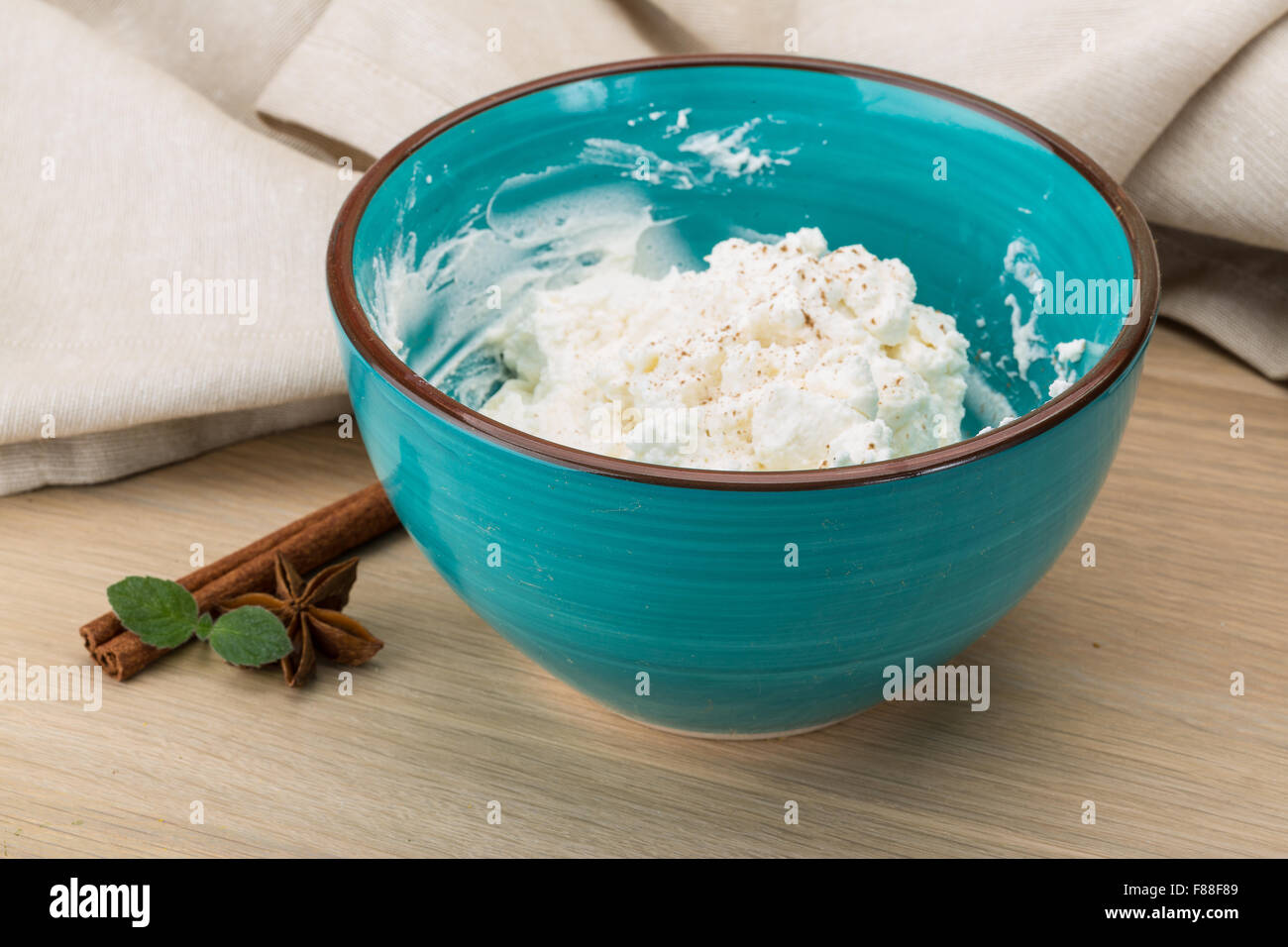 Ricotta cheese with cinnamon and mint leaves Stock Photo Alamy