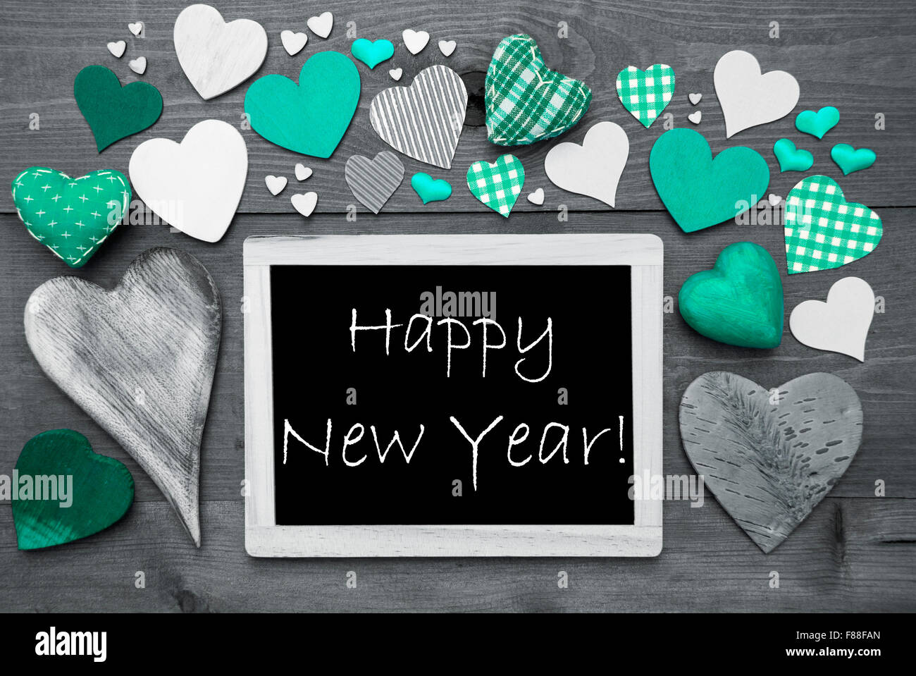 Black And White Chalkbord, Many Green Hearts, Happy New Year Stock Photo