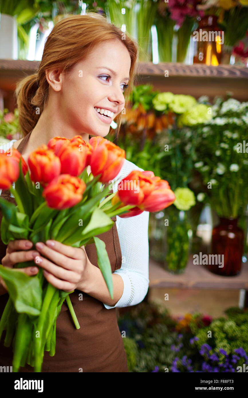 Young girl florist with flowers in flowers shop Stock Photo - Alamy