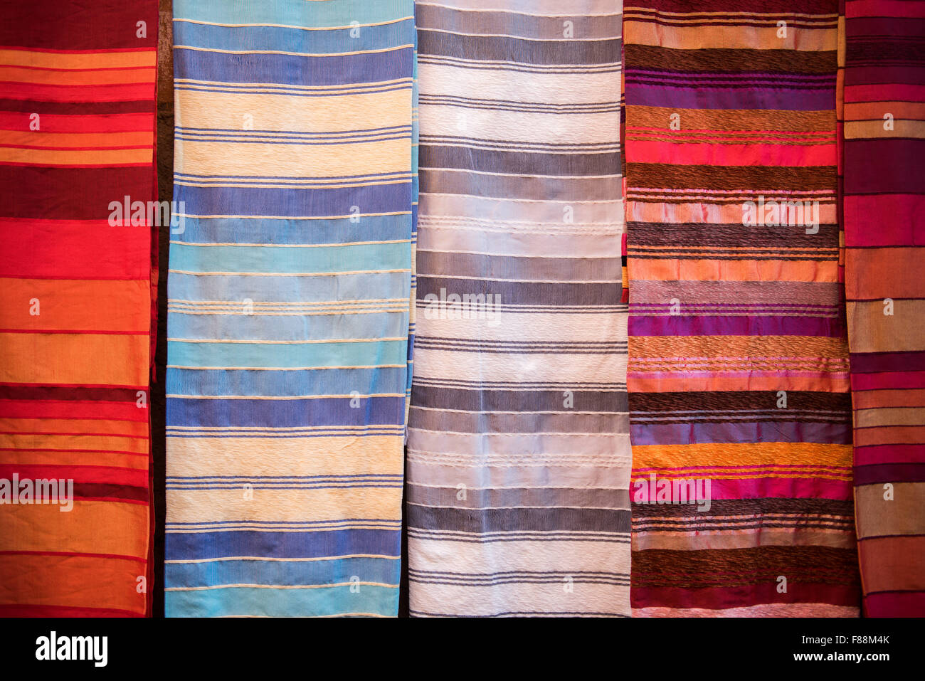 Moroccan blankets for sale in the souk in Marrakesh Stock Photo
