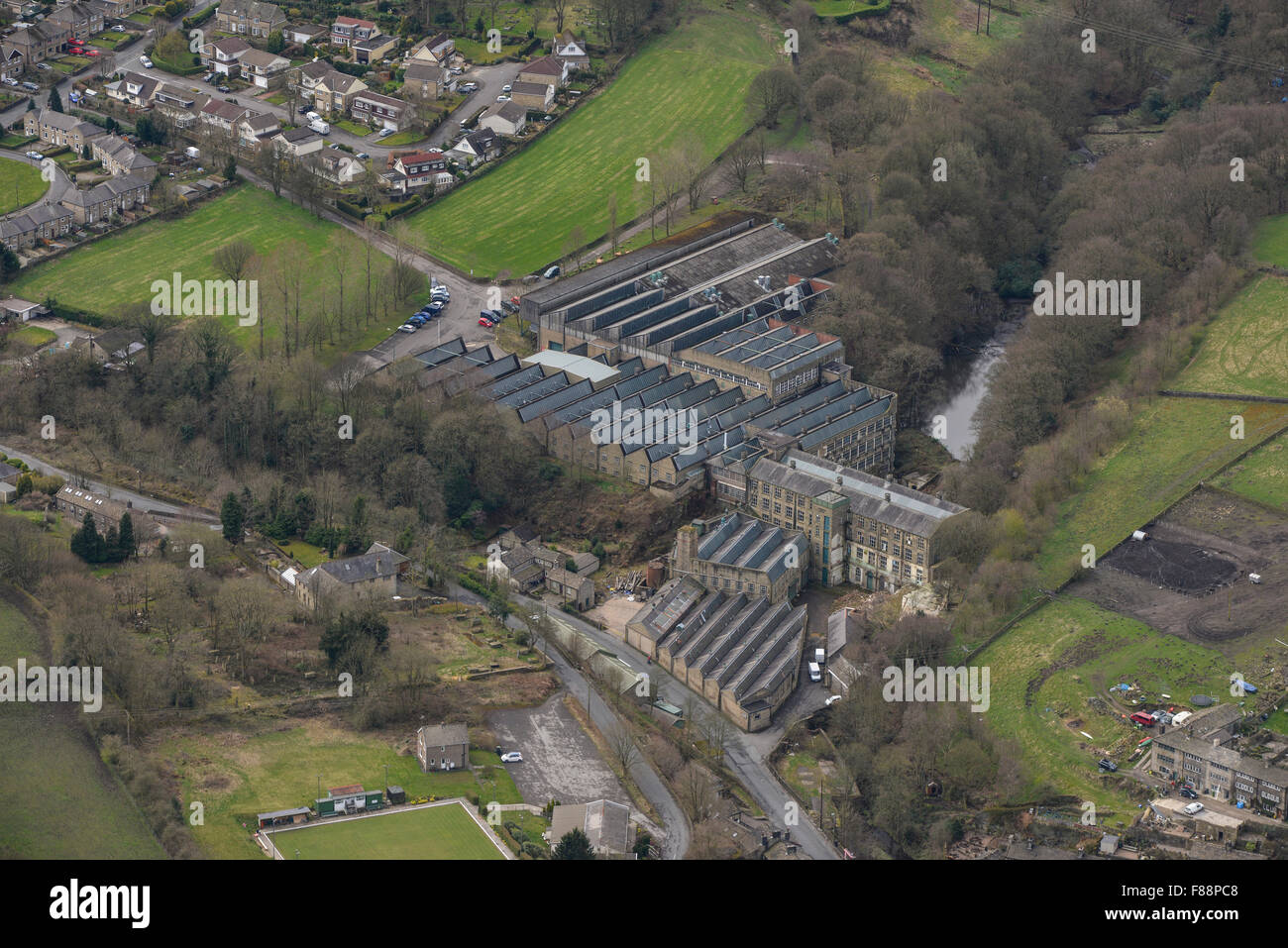 An aerial view of an old mill the West Yorkshire village of Hepworth