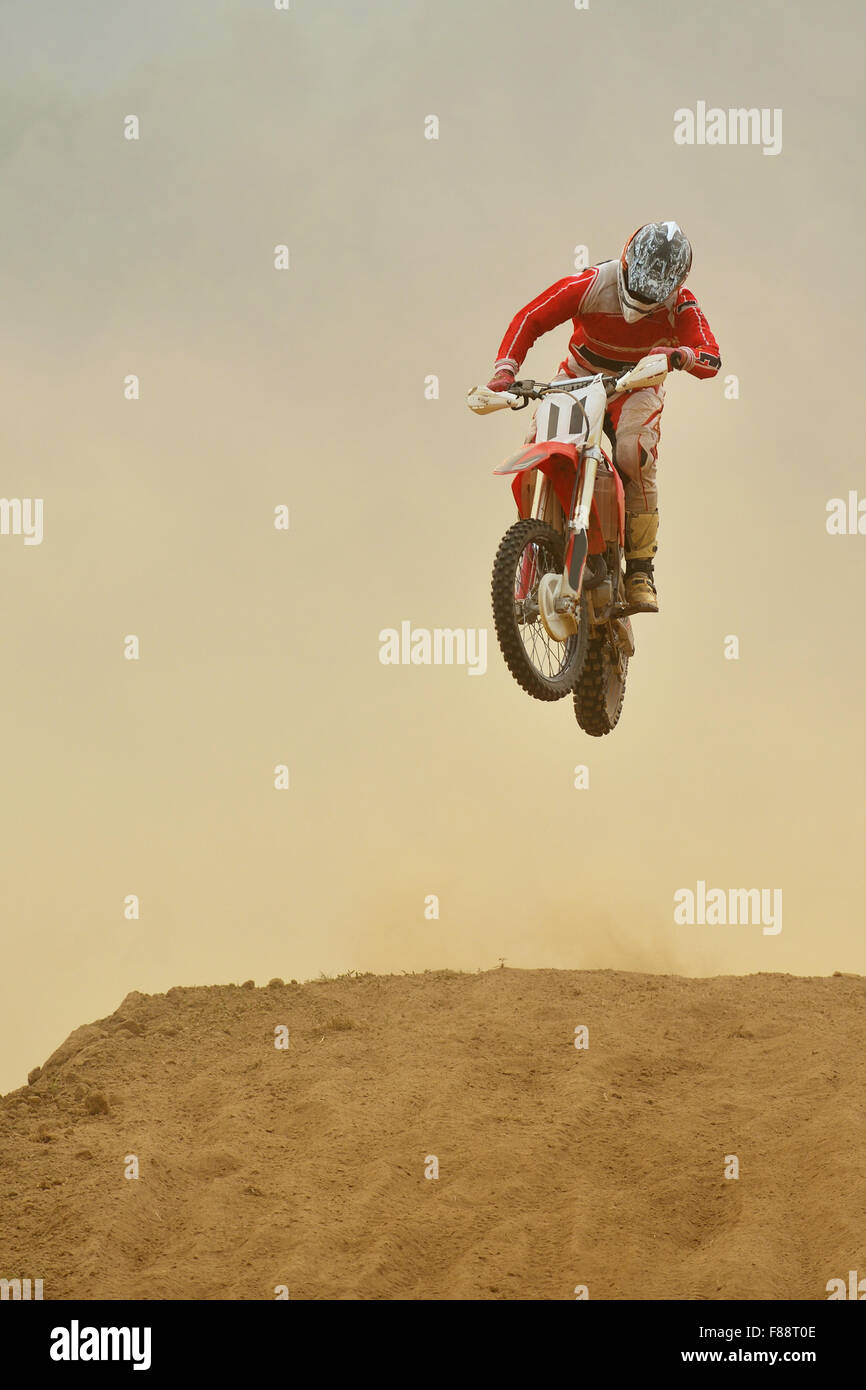 motocross bike in a race representing concept of speed and power in ... - E-Motocross Bike Reaches Muscles