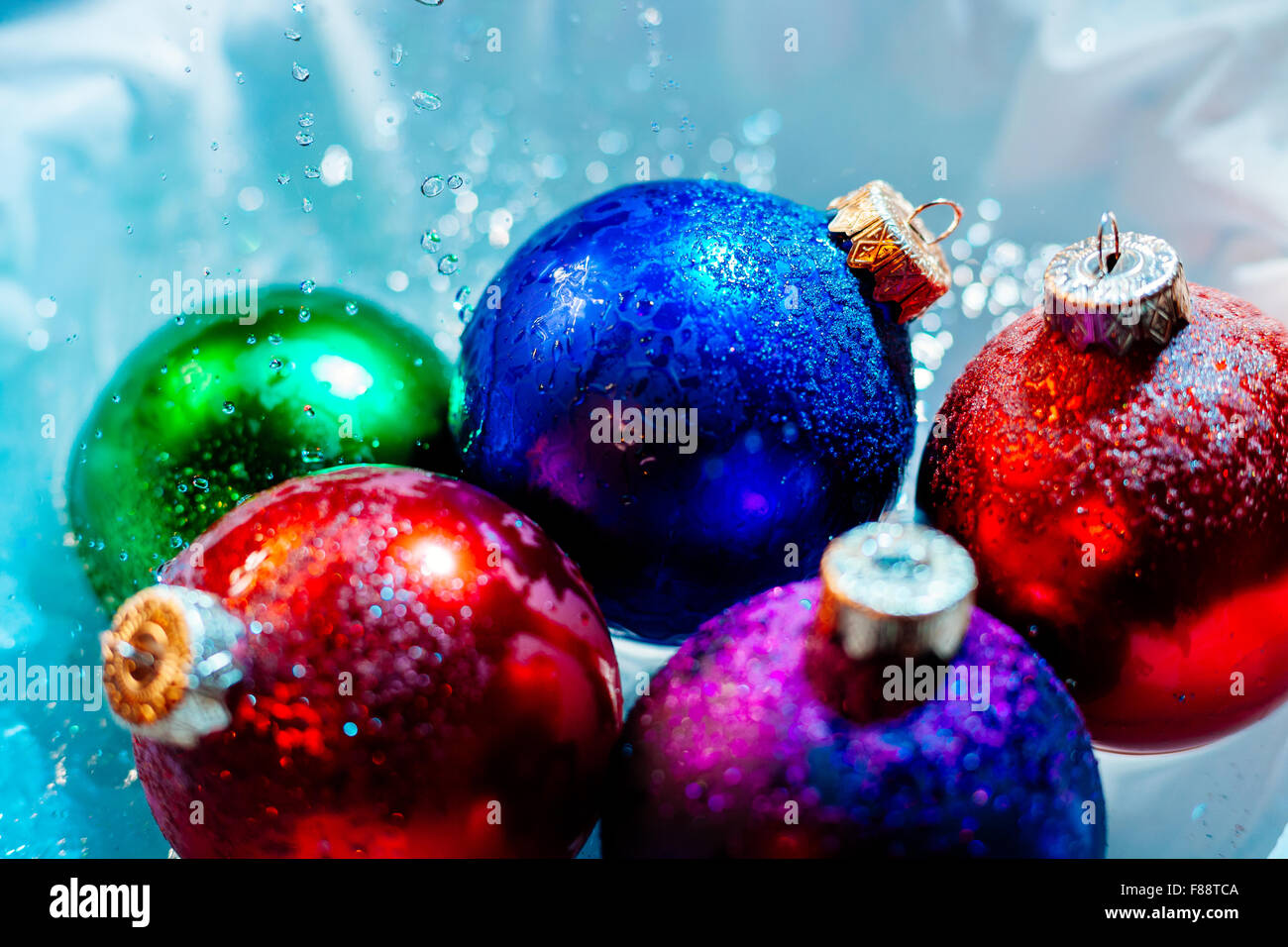 new year ice balls melt ice water winter seasonal with water drops  background wallpaper Stock Photo - Alamy