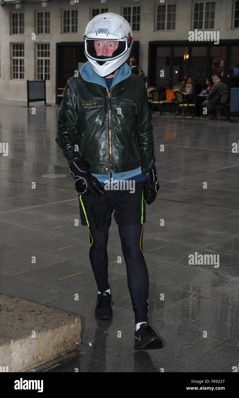 Chris Evans wearing a motorcycle helmet while out in London Featuring