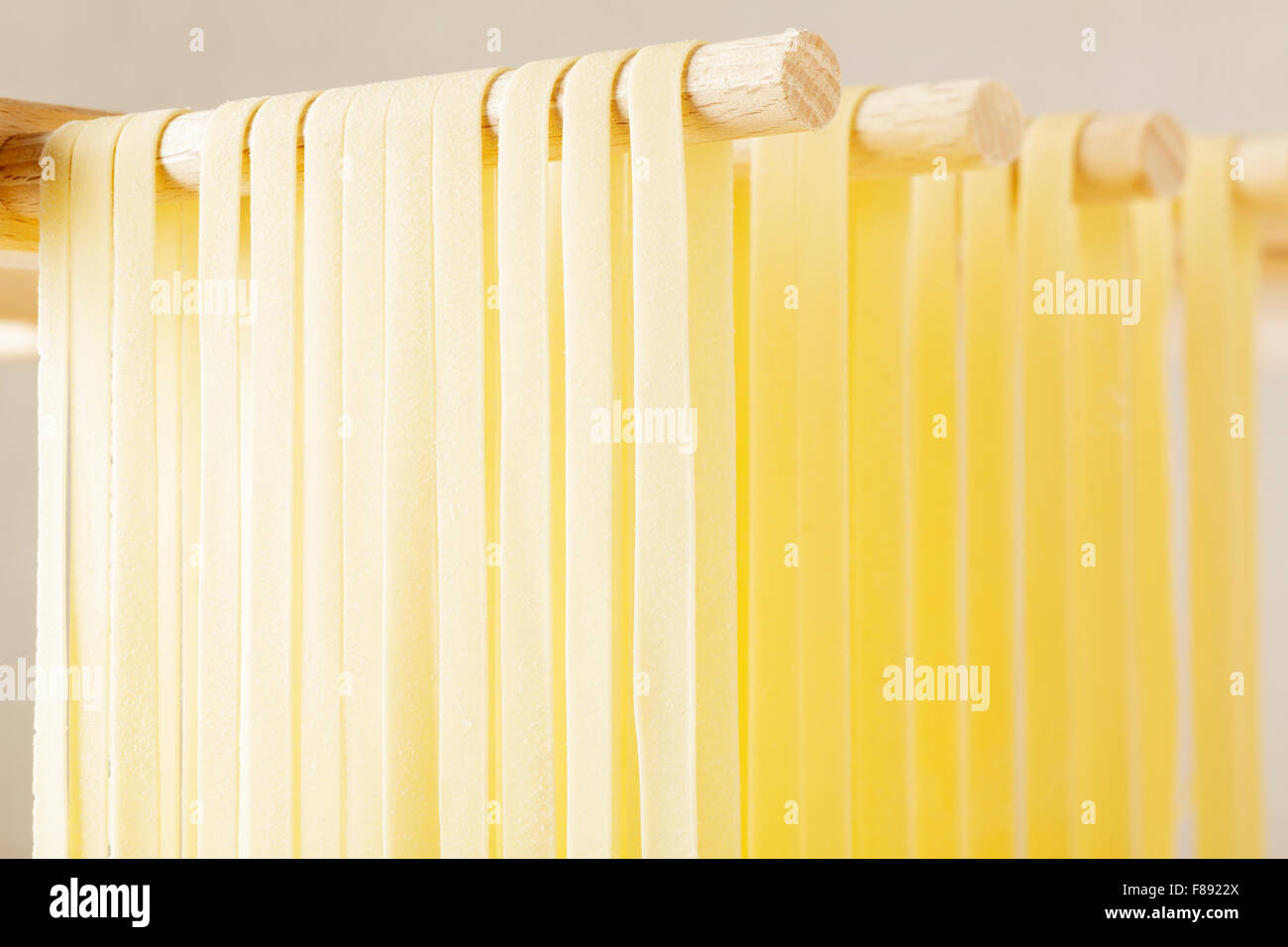 Fresh Tagliatelle pasta drying Stock Photo
