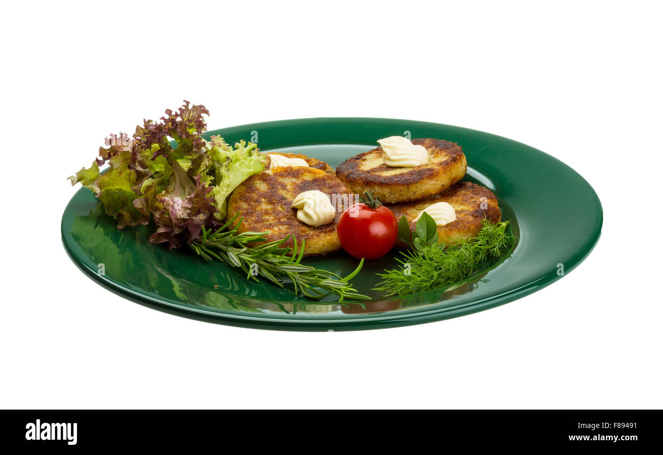 Hash browns with herbs on the plate Stock Photo Alamy