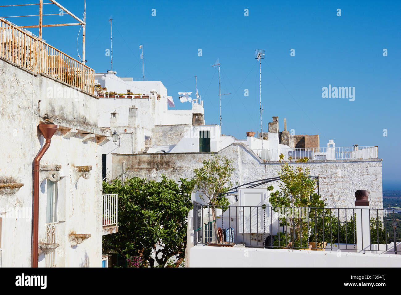 Terraces of apartments in Ostuni known as La Citta Bianca (the white city) Brindisi province Apulia Puglia Italy Europe Stock Photo