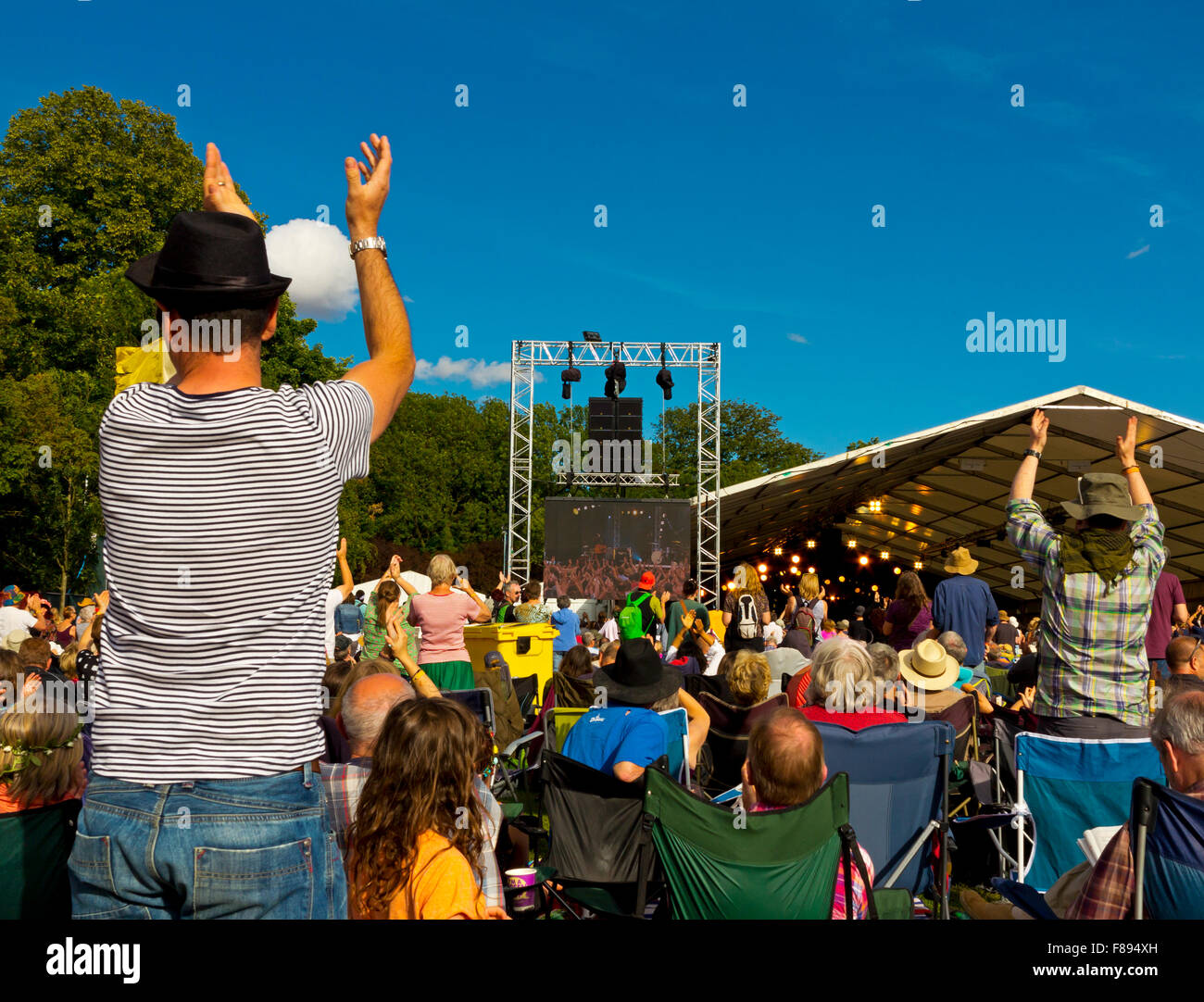 Crowd enjoying a performance at the Cambridge Folk Festival held every summer at Cherry Hinton in Cambridgeshire England UK Stock Photo