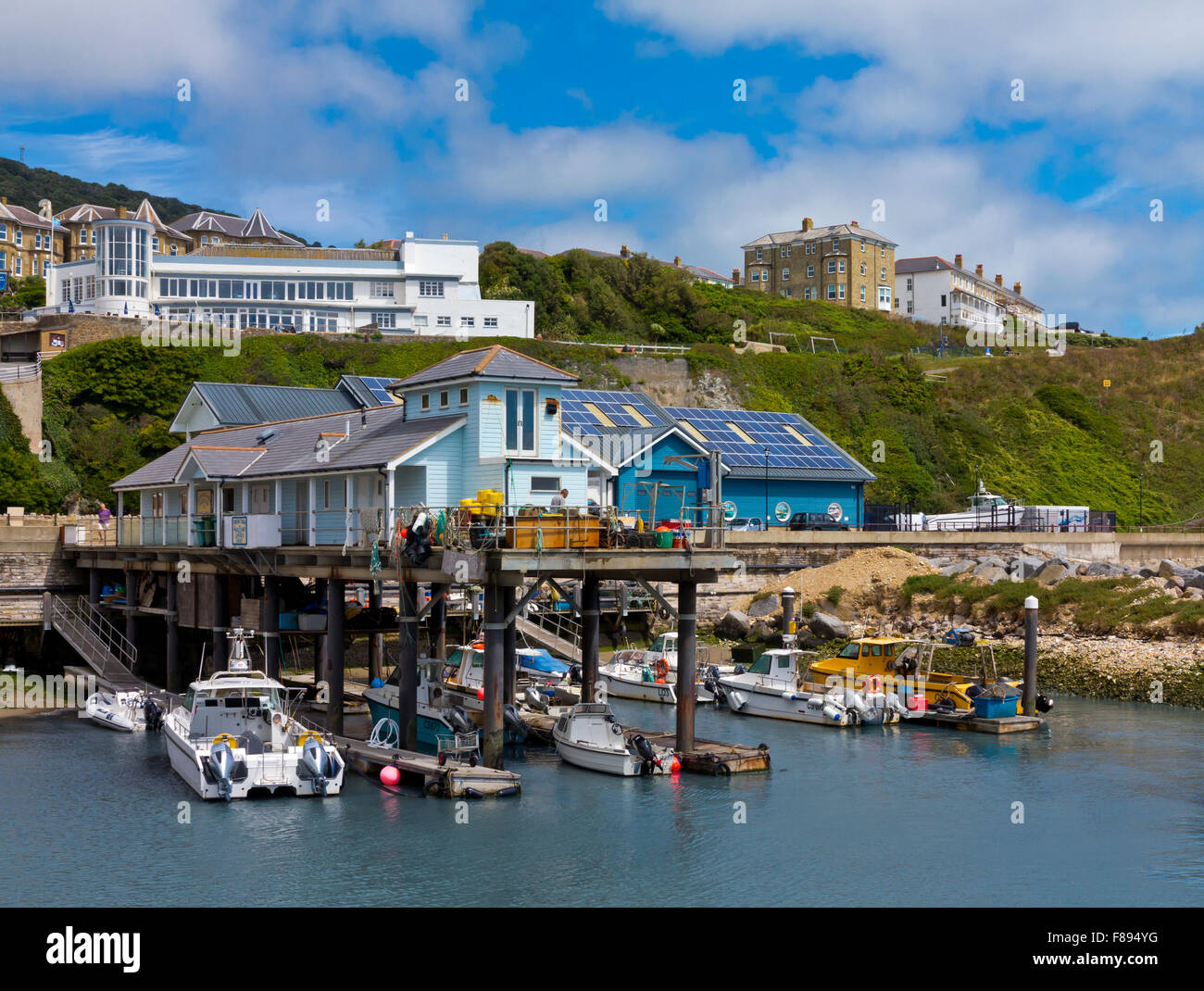 The harbour and jetty at Ventnor a seaside resort on the south coast of the Isle of Wight in southern England UK Stock Photo