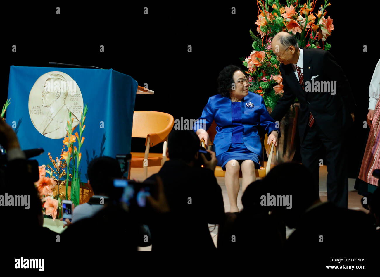 Stockholm, Sweden. 7th Dec, 2015. The 2015 Nobel Prize laureates for Physiology or Medicine Satoshi Omura (R) and Tu Youyou attend a lecture in Karolinska Institutet, Stockholm, capital of Sweden, Dec. 7, 2015. Credit:  Ye Pingfan/Xinhua/Alamy Live News Stock Photo