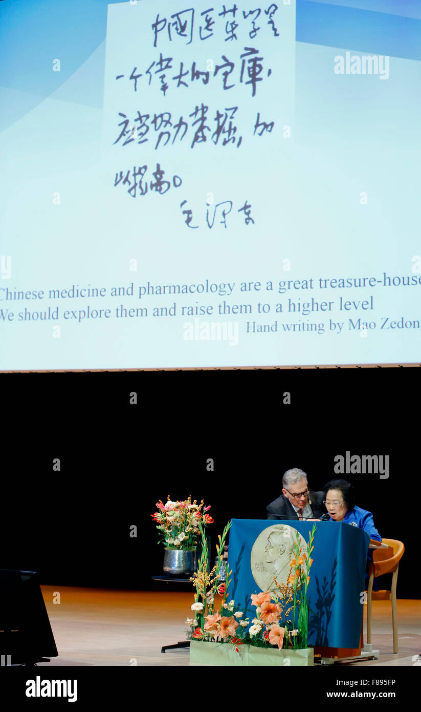 Stockholm, Sweden. 7th Dec, 2015. China's Tu Youyou (R) who won 2015 Nobel Prize in Physiology or Medicine gives a lecture in Karolinska Institutet, Stockholm, capital of Sweden, Dec. 7, 2015. Credit:  Ye Pingfan/Xinhua/Alamy Live News Stock Photo