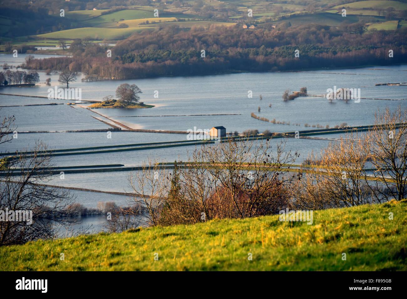 Kendal, Cumbria, UK. 07th Dec, 2015. Aftermath of Storm Desmond. Flooding in the Lyth Valley, near Kendal, Cumbria. This was the scene on Monday 7th.December, two days after the height of Storm Desmond on Saturday 5th.December. Credit:  Stan Pritchard/Alamy Live News Stock Photo