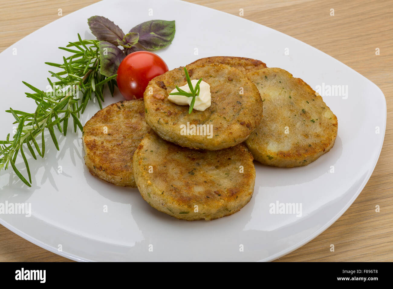 Hash brown with cream and herbs Stock Photo Alamy