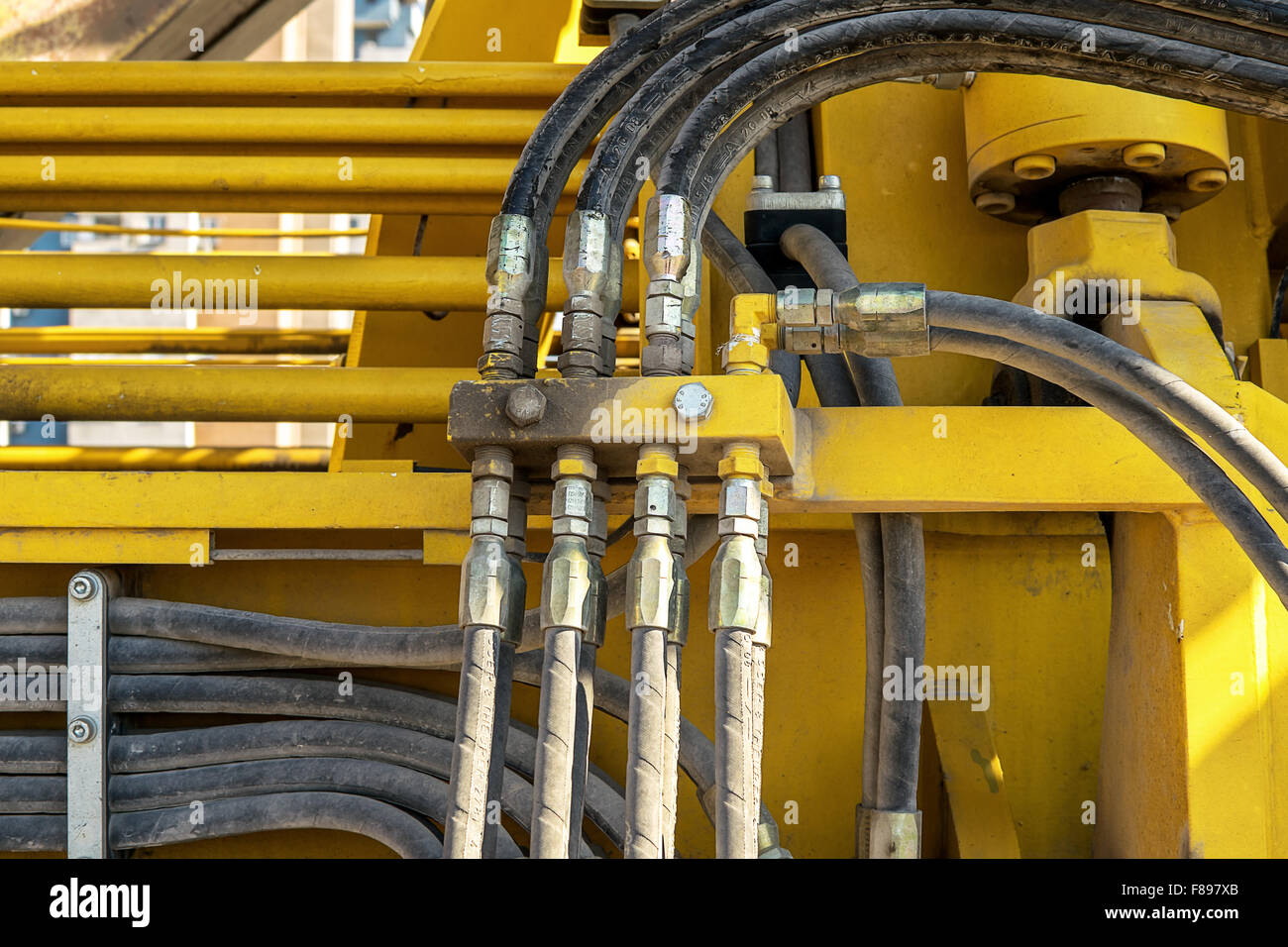 Hydraulic system hoses and pipes on train. Stock Photo