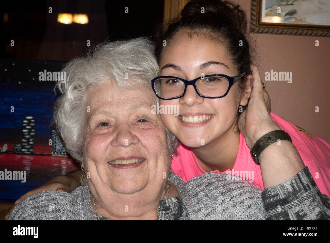Adoring grandmother and granddaughter age 79 and 15 having a happy moment together. Downers Grove Illinois IL USA Stock Photo