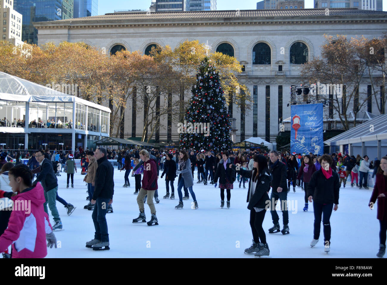 People ice skating at the rink at Bryant Park in New York City. Stock Photo