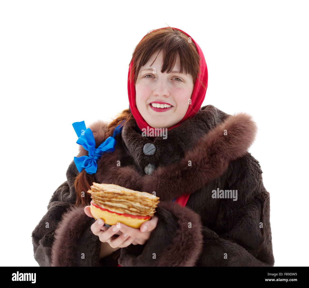 Woman in fur coat with pancake. Isolated over white Stock Photo