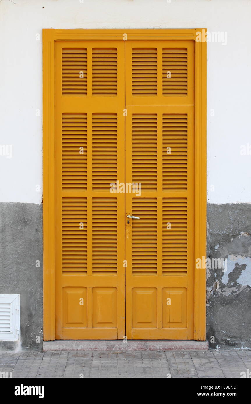 Italian style house entrance with shutters Stock Photo