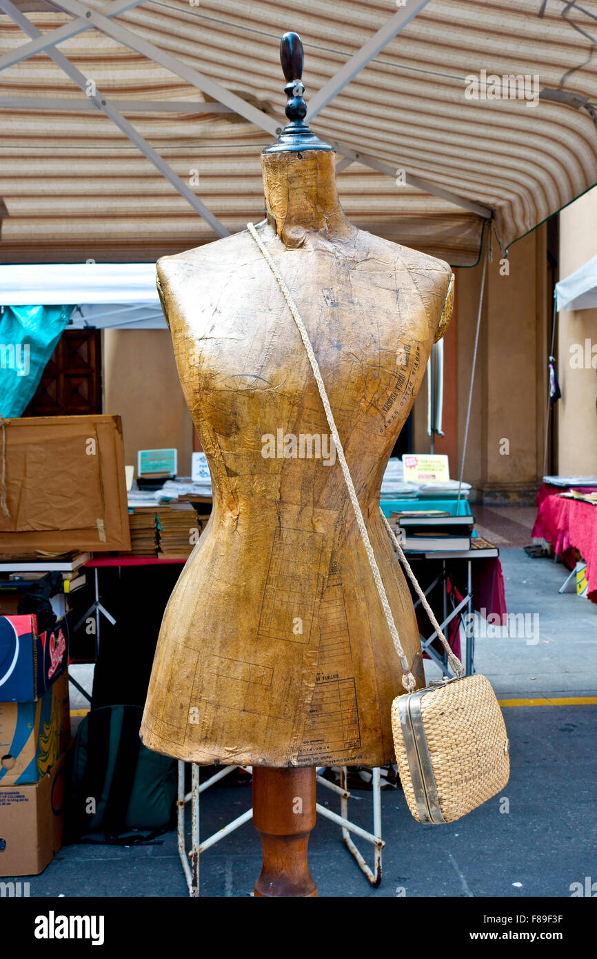 Mannequin with a shoulder bag at the flea market, piazza Santo Stefano