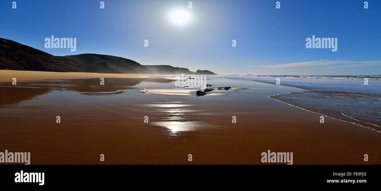 Portugal, Algarve: Scenic beach panorama of natural bay in Rogil Stock Photo
