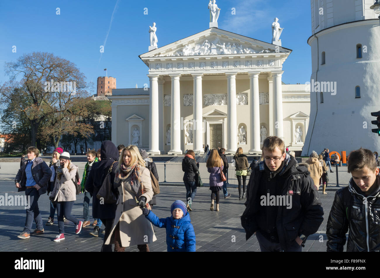 Locals at pedestrian crossing next to Vilnius Cathedral. Vilnius, Lithuania, Europe Stock Photo