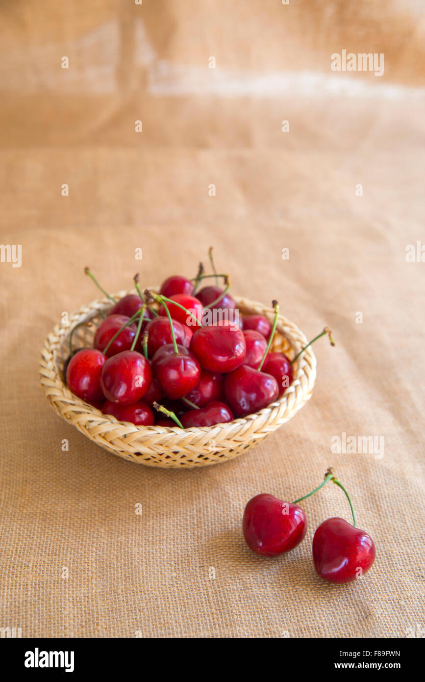 Cherries in a basket. Still life Stock Photo Alamy