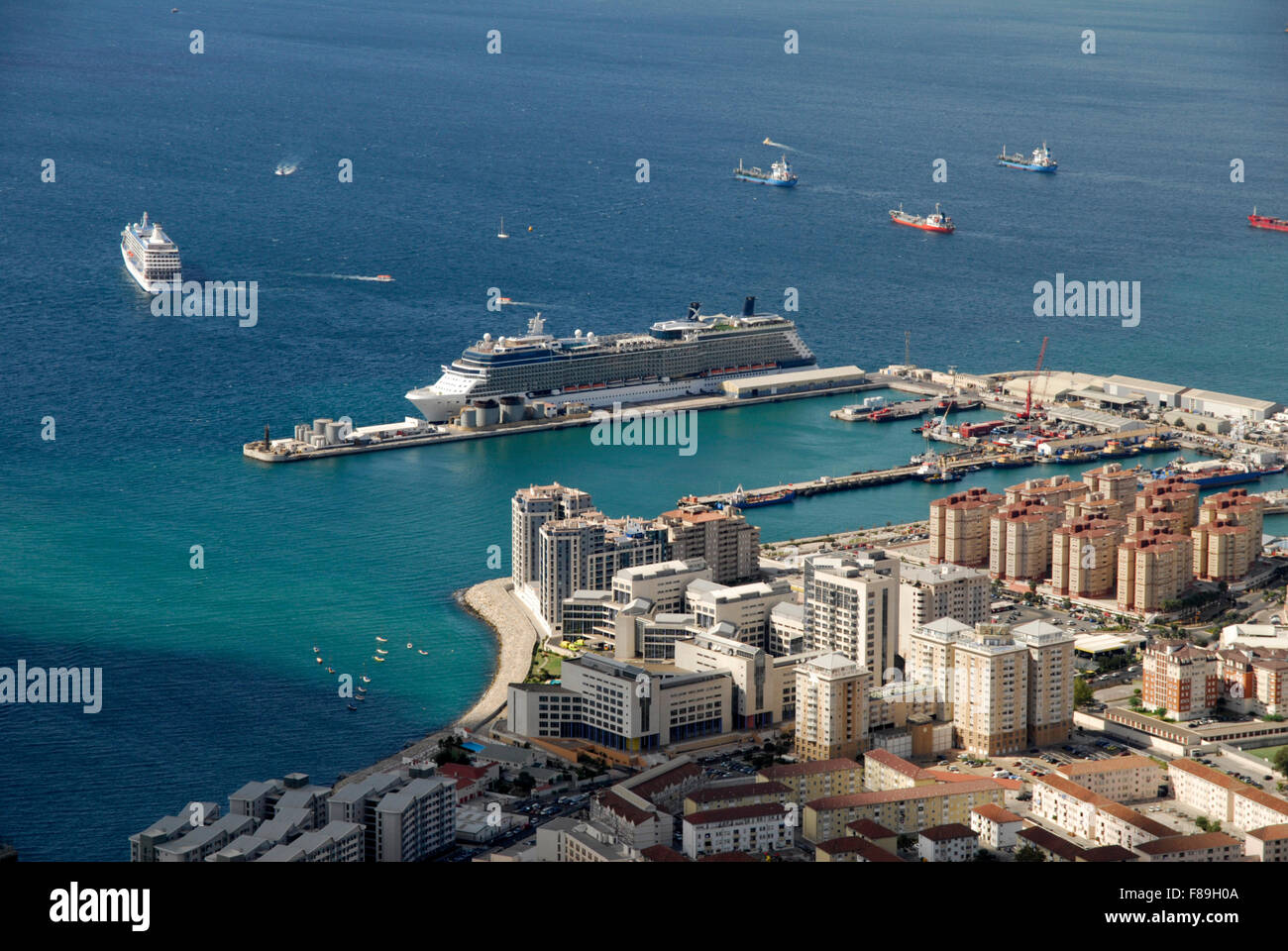 Looking down on new development in Gibraltar with a cruise liner moored in the background. Stock Photo