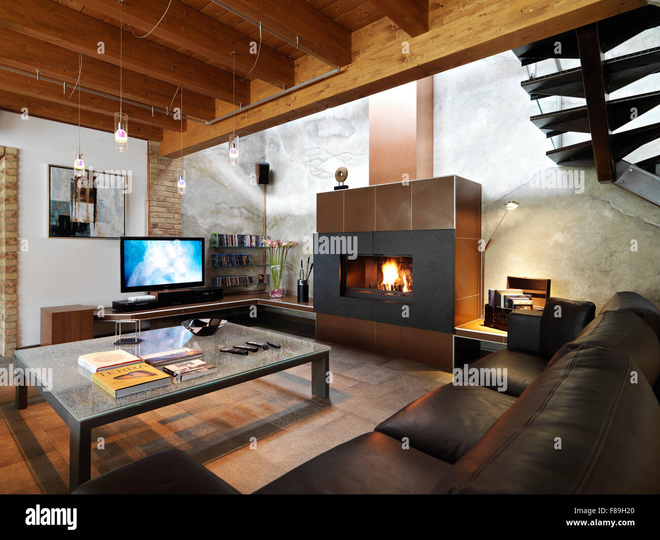 modern fireplace and leather sofa in the modern living room Stock Photo ...