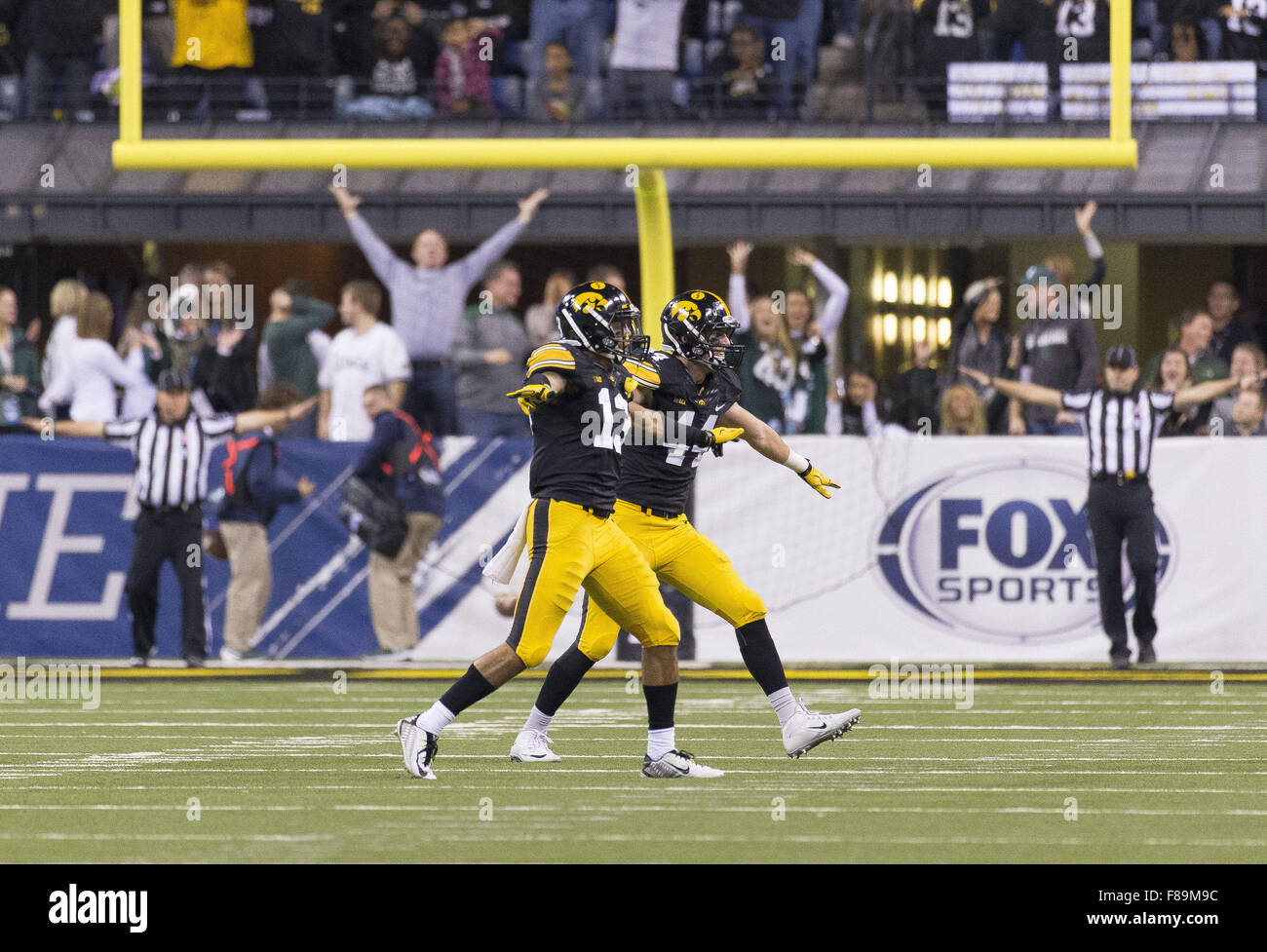 Indianapolis, Iowa, USA. 5th Dec, 2015. Iowa Hawkeyes defensive back Greg Mabin (13) and Iowa Hawkeyes linebacker Ben Niemann (44) celebrate a missed field goal attempt in the Big Ten Championship at Lucas Oil Stadium Between the Michigan State Spartans and the Iowa Hawkeyes in Indianapolis, In., Saturday, Dec. 5th, 2015. © Louis Brems/Quad-City Times/ZUMA Wire/Alamy Live News Stock Photo