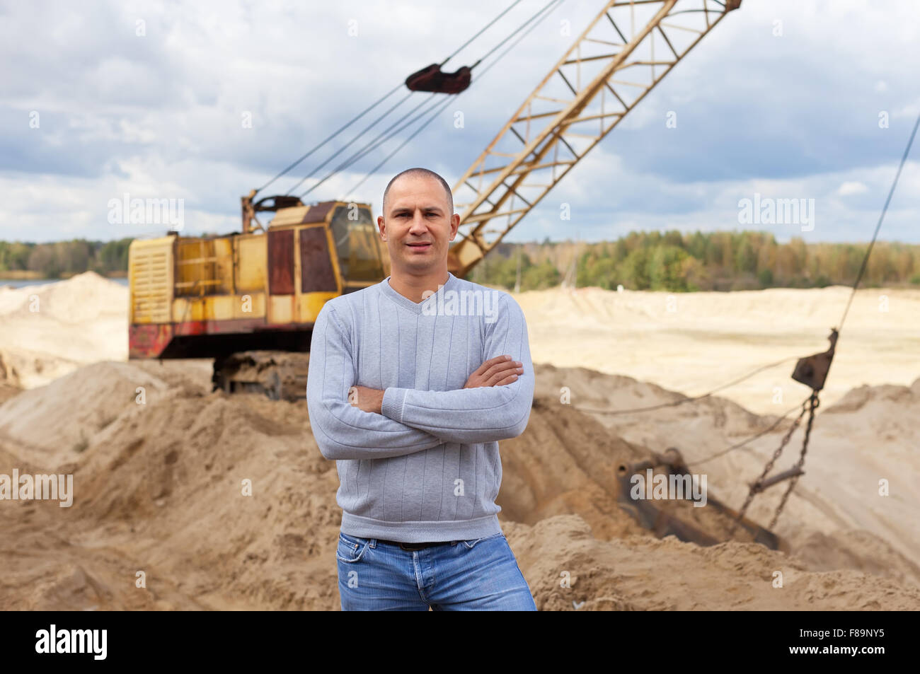 Portrait of worker  at sand pit Stock Photo