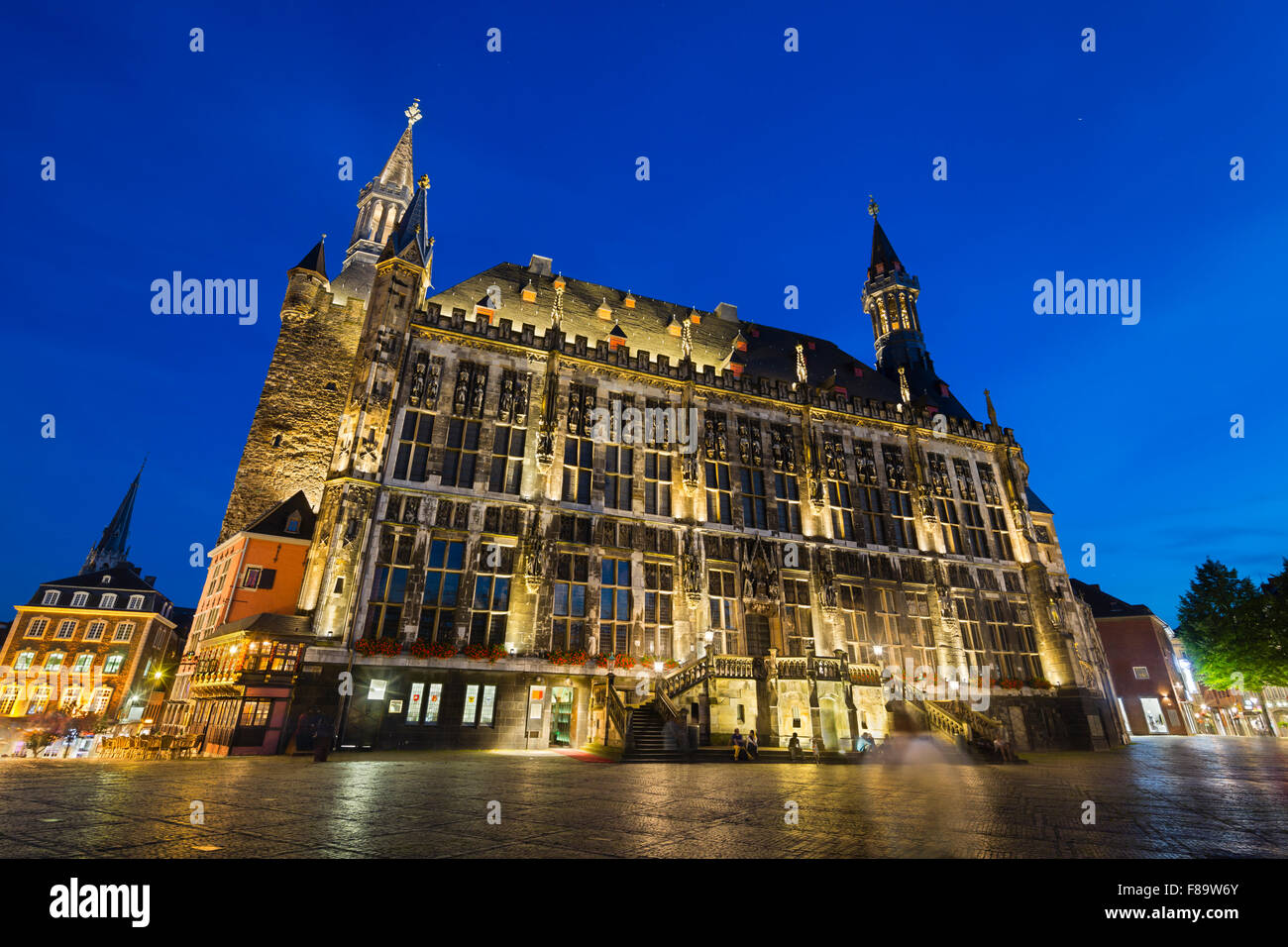 The old town hall of Aachen, Germany with night blue sky. Stock Photo